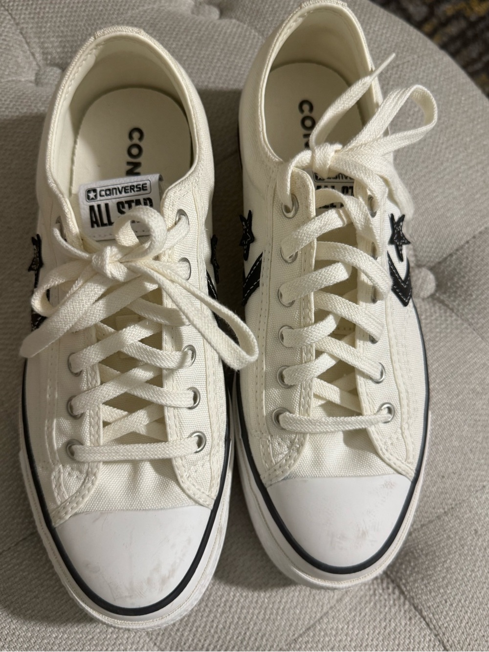 Converse Women’s Low-Top Sneakers in White with Black Star Accents